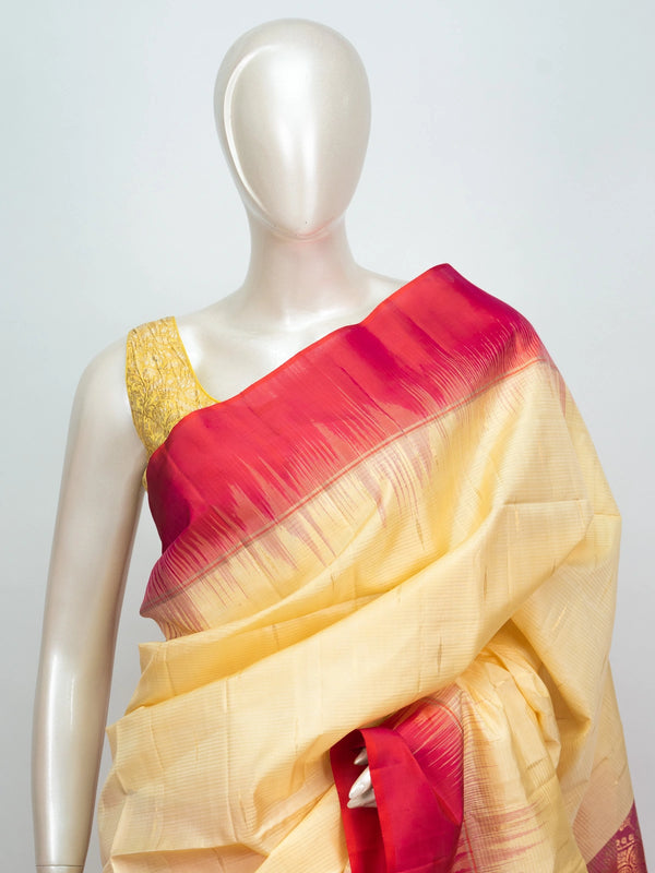 Cream soft silk saree with contrast red zari border and woven zari pallu