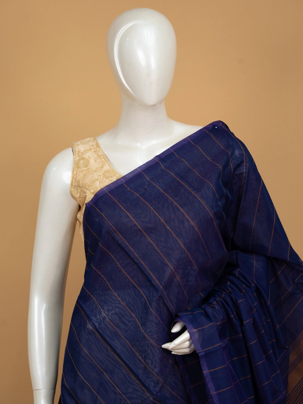 Navy blue silk cotton saree with copper stripes and contrast striped pallu