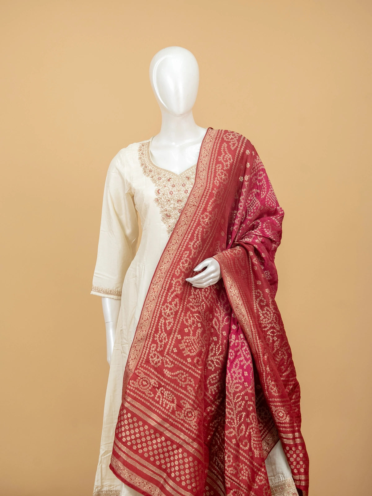 Cream zari embroidered anarkali kurti set with maroon bandhani dupatta and cream straight pants