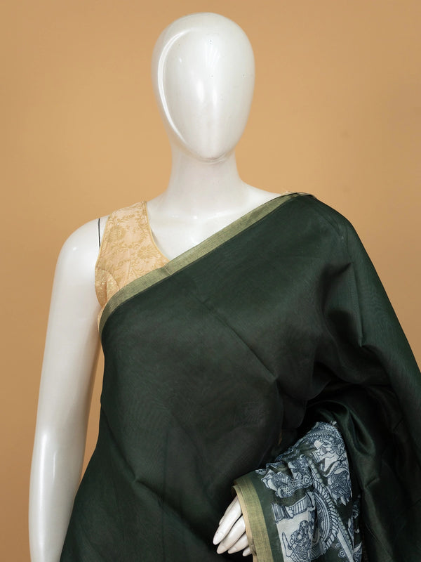Dark green linen cotton saree with off-white Kalamkari peacock and floral printed pallu and gold zari border