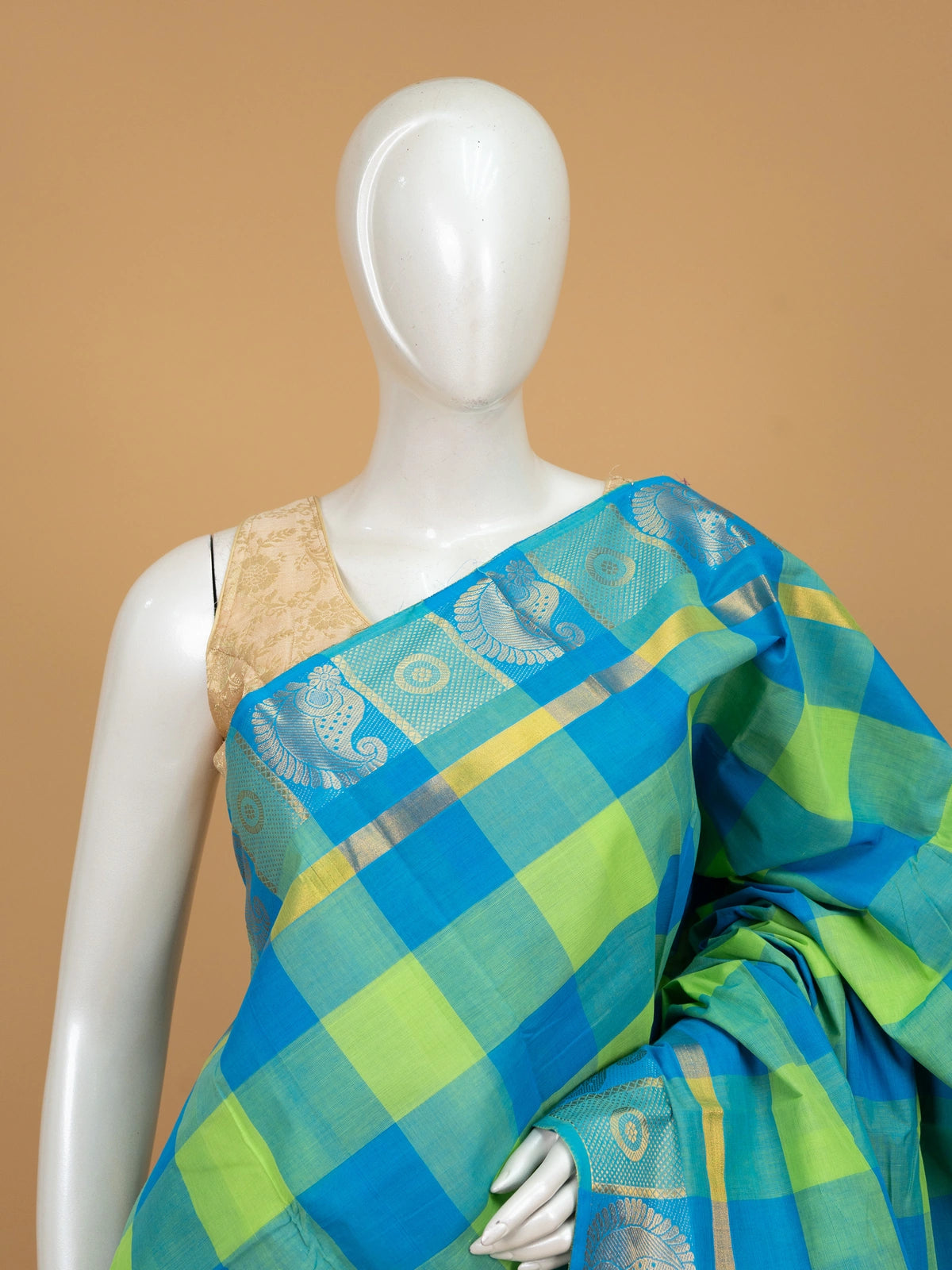 Blue and green checked Chettinad cotton saree with contrast blue zari paisley border