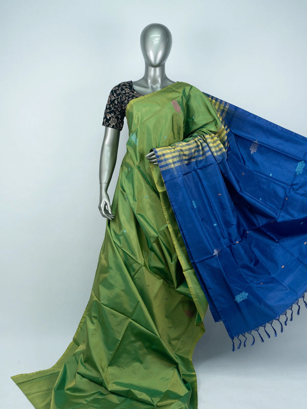 Green Banana Silk saree with royal blue contrast pallu, woven buttas and yellow-blue zari border