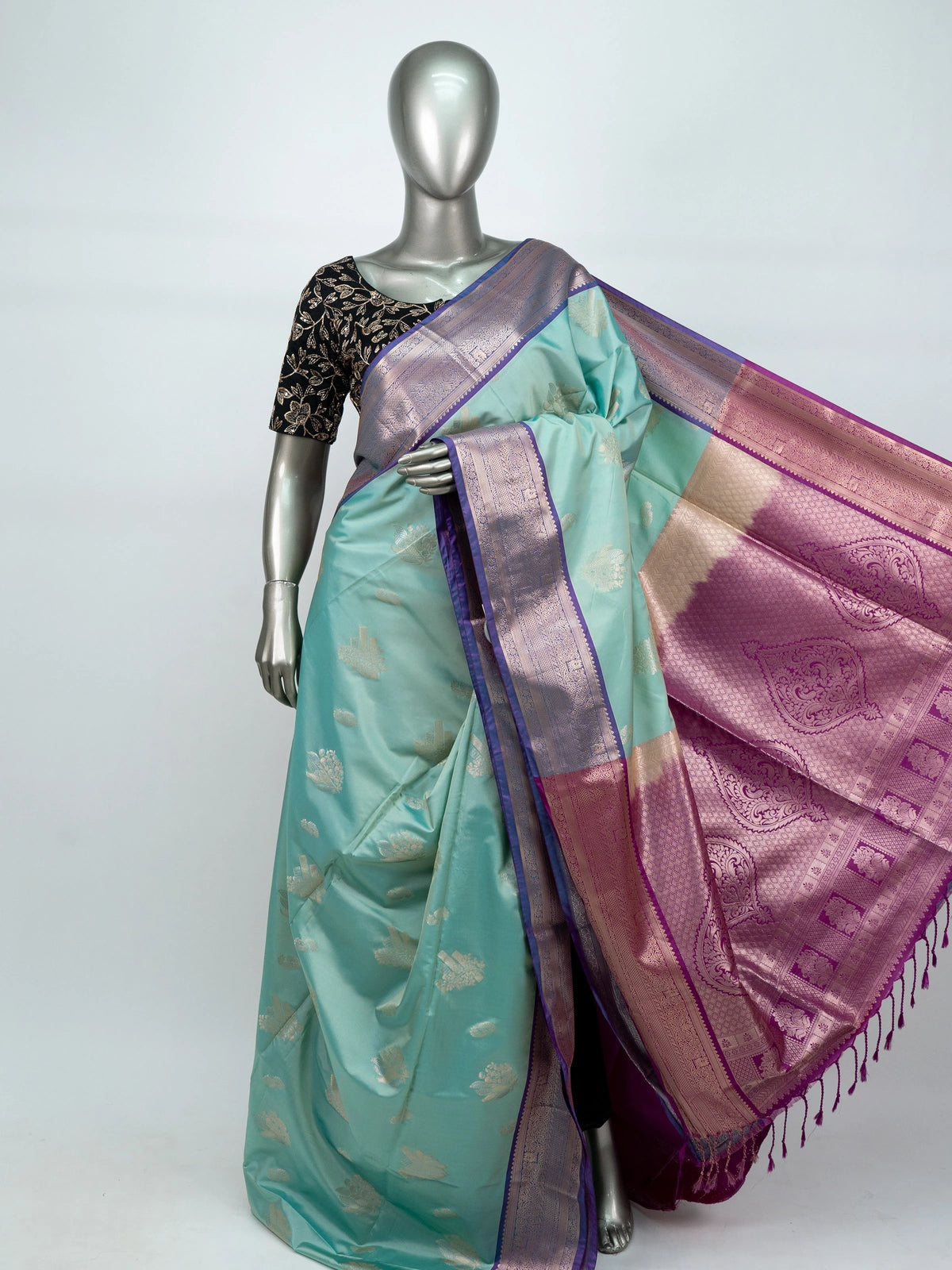 Turquoise and purple semi silk saree with silver zari border and paisley pallu
