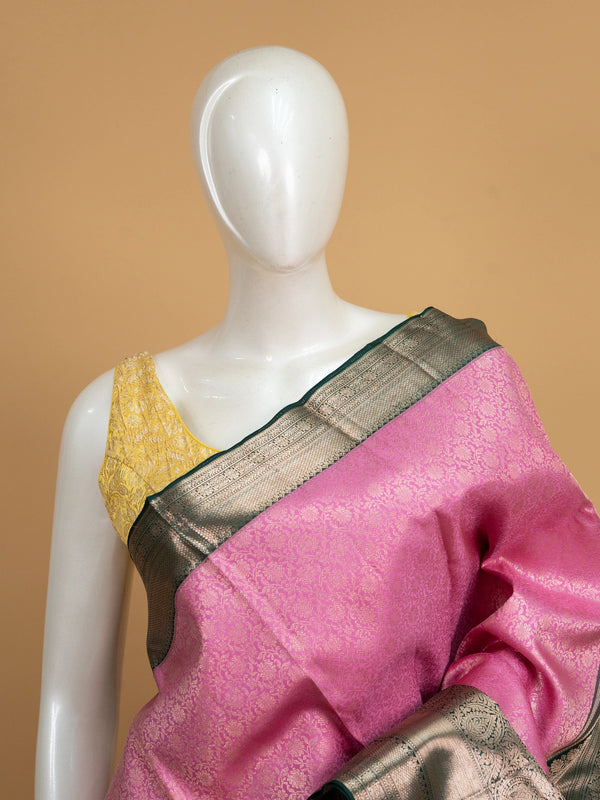 Pink pure Kanchipuram silk saree with contrast green gold zari border and pallu