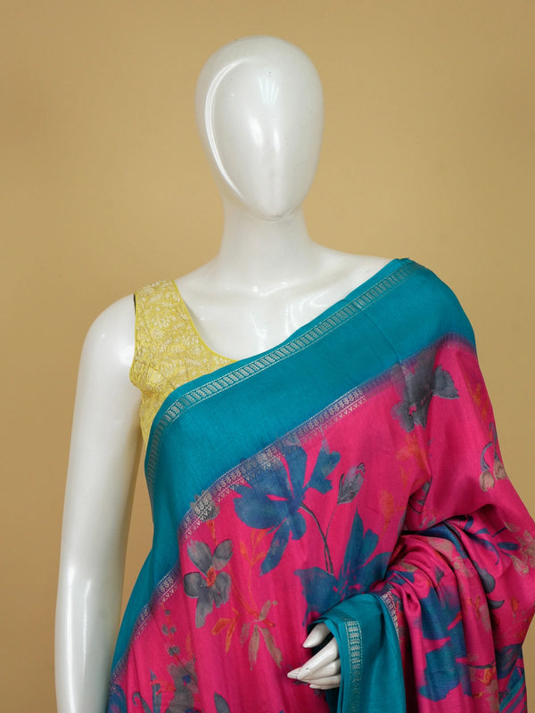 Pink Dola silk saree with multicolour floral print and contrast teal blue zari border