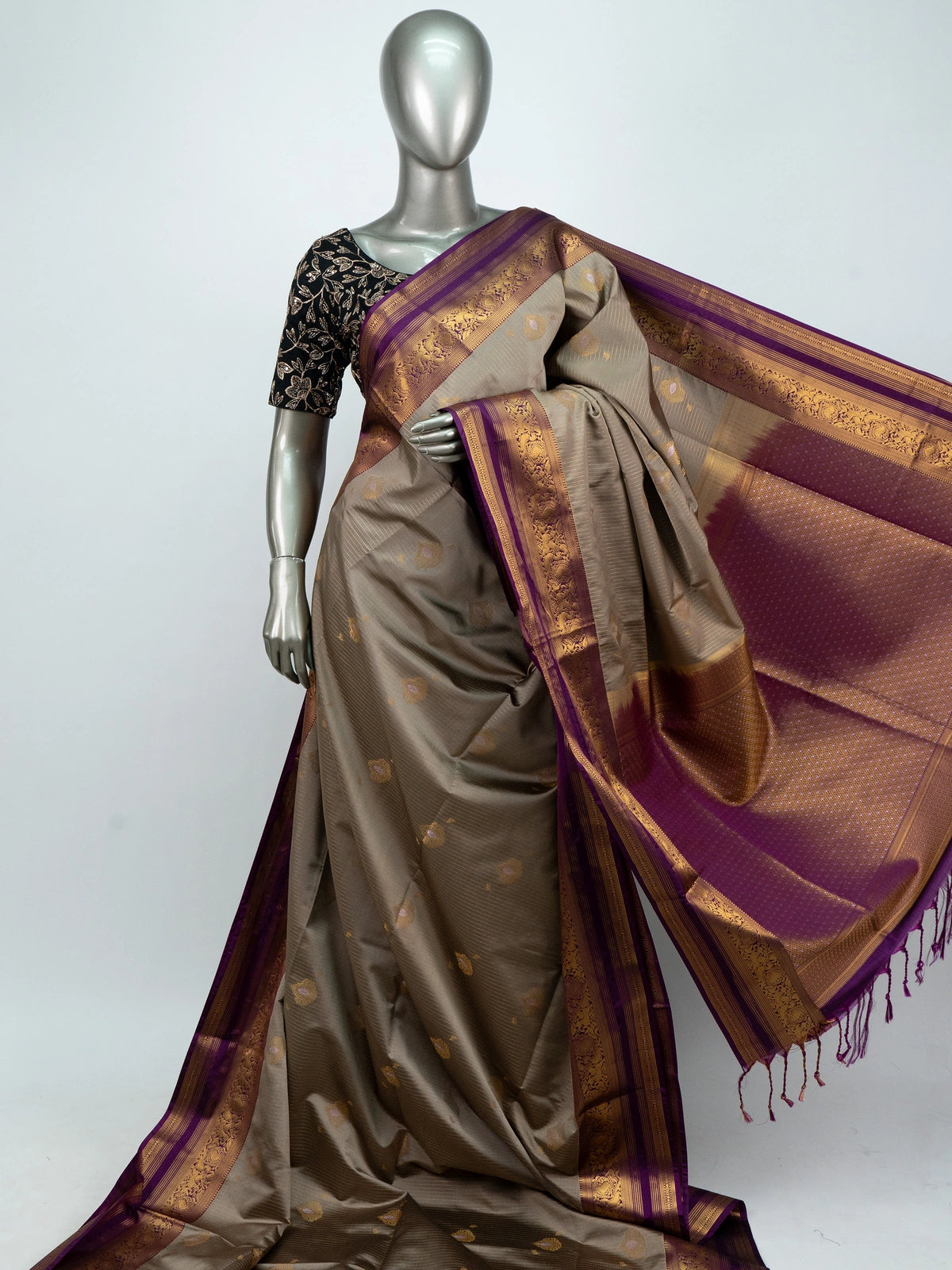Taupe semi silk saree with Vaira Oosi needle-line weave and contrast purple gold zari border