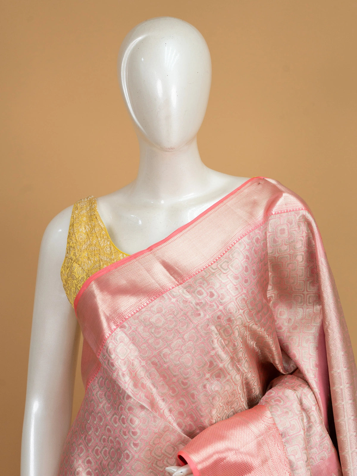 Rose pink Pure Kanchipuram silk saree with silver zari jaal body, contrast border and floral zari pallu