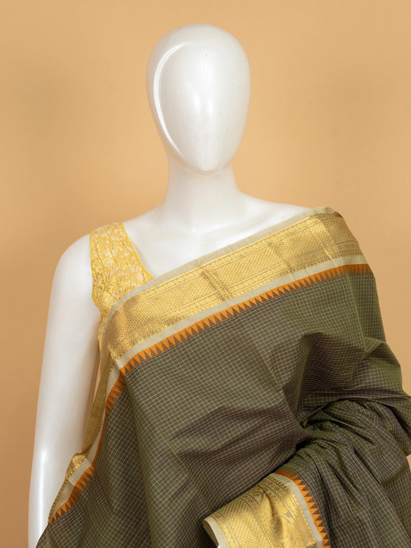 Olive green Chettinad cotton saree with checked body and gold zari border