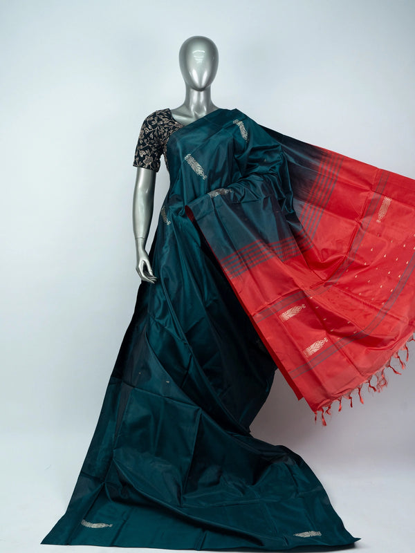 Teal green banana silk saree with gold zari buttas and contrast red striped pallu
