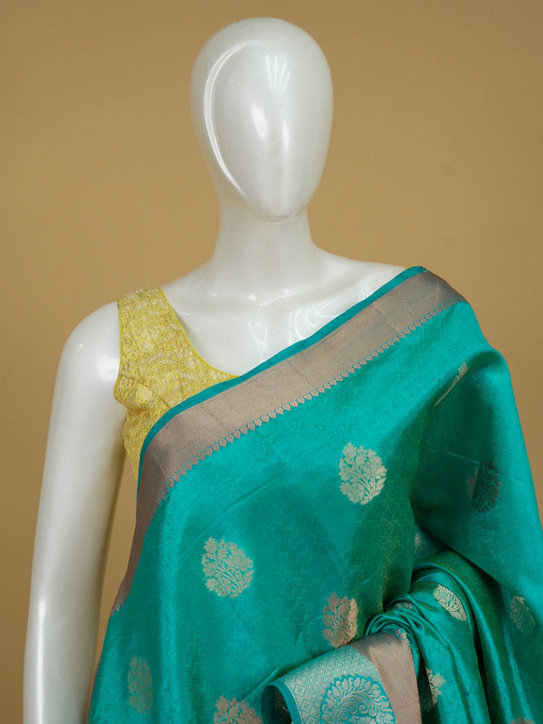Teal green semi tussar saree with gold zari floral buttas and contrast zari border