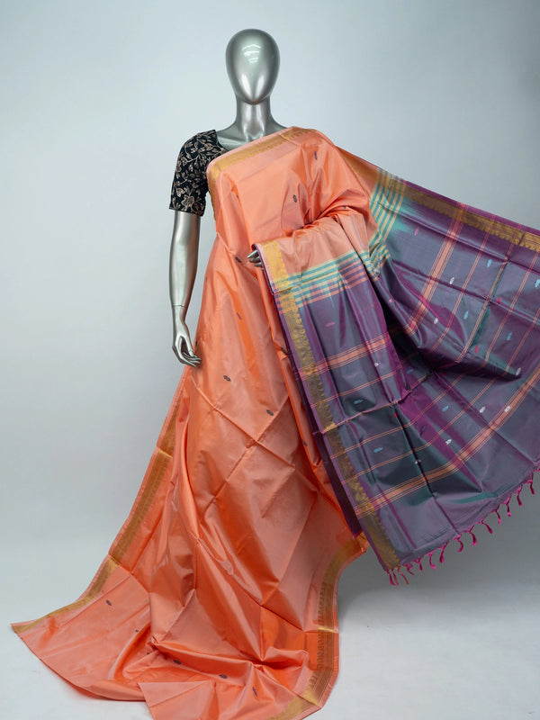 Peach Banana Silk saree with gold zari border, contrast grey checked pallu and embroidered black blouse