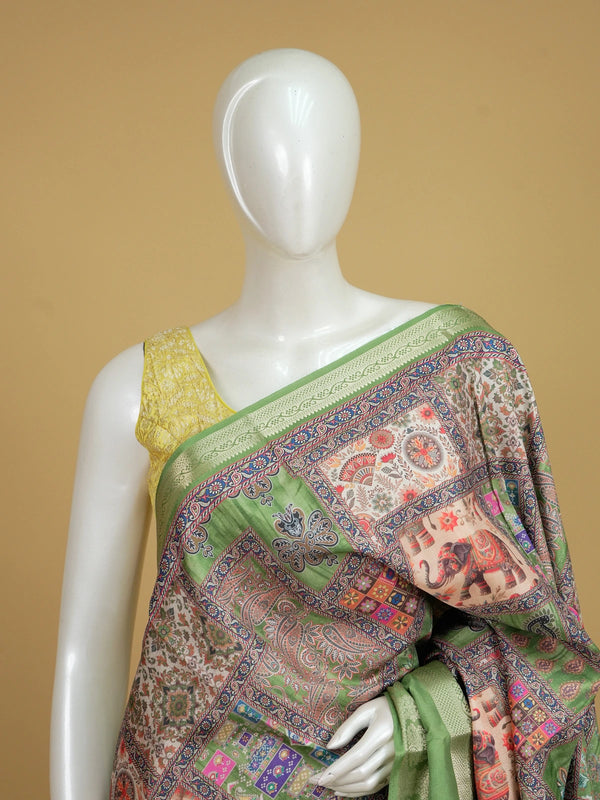 Green multicolour patchwork print Dola silk saree with elephant motifs and contrast zari border