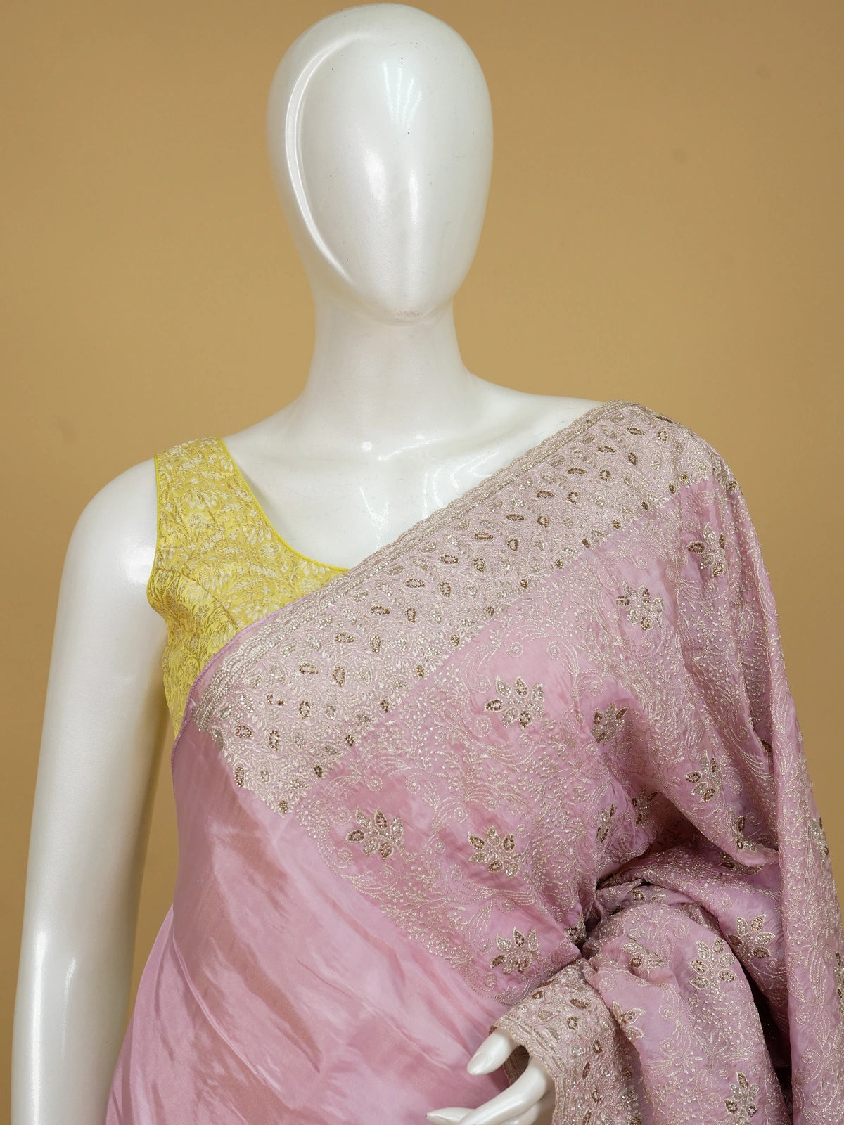 Dusty pink designer saree with all-over silver floral and paisley embroidery and an ornate border