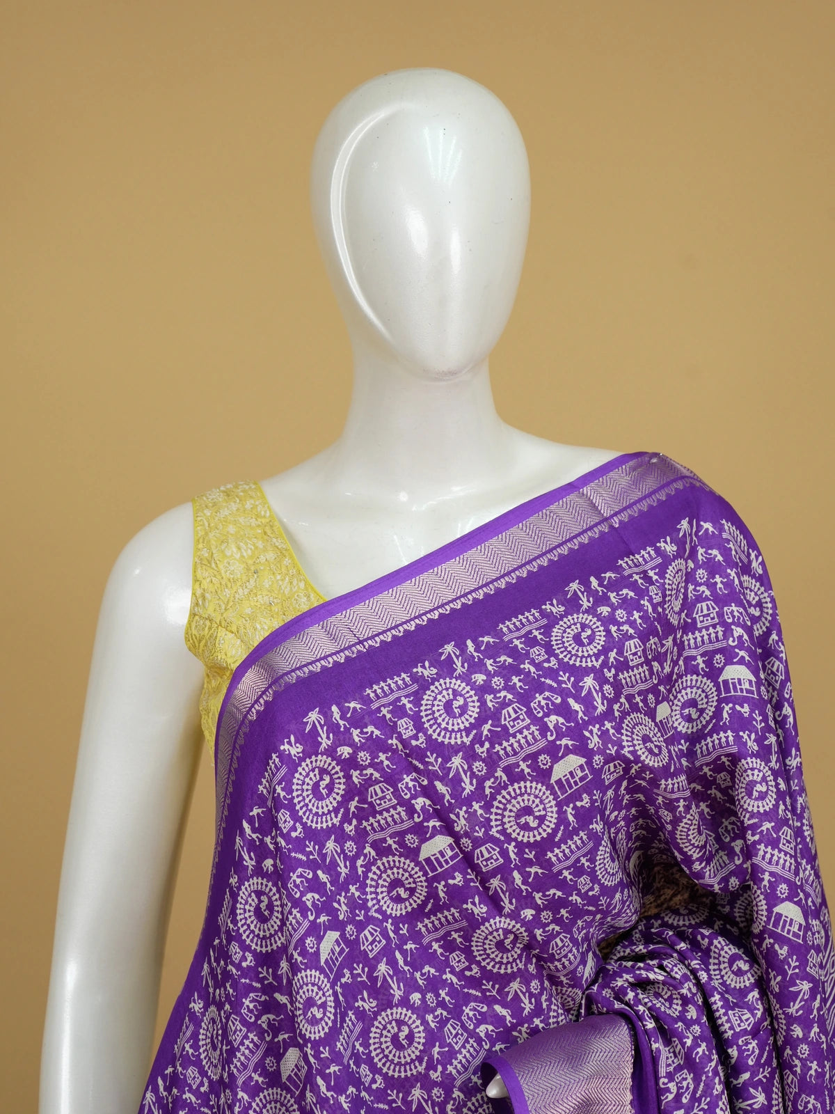 Purple Dola silk saree with white Warli tribal print and silver zari border