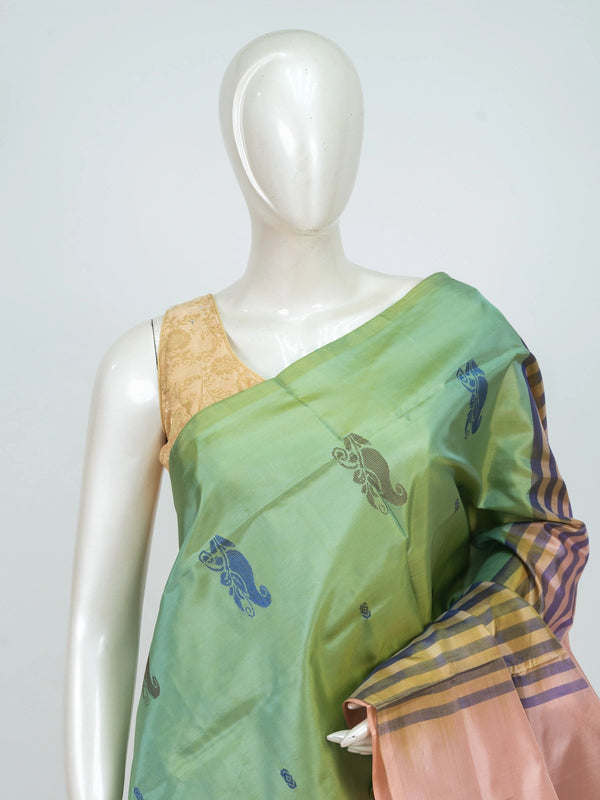 Green and peach Banana Silk saree with woven paisley motifs and striped contrast border