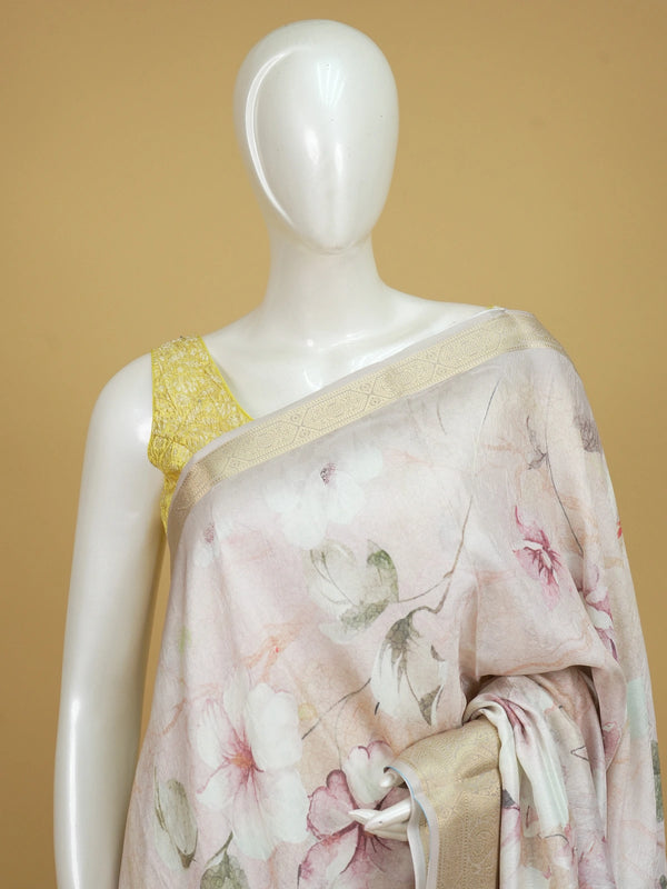 Pastel beige and pink floral designer art silk saree with gold zari border and printed pallu