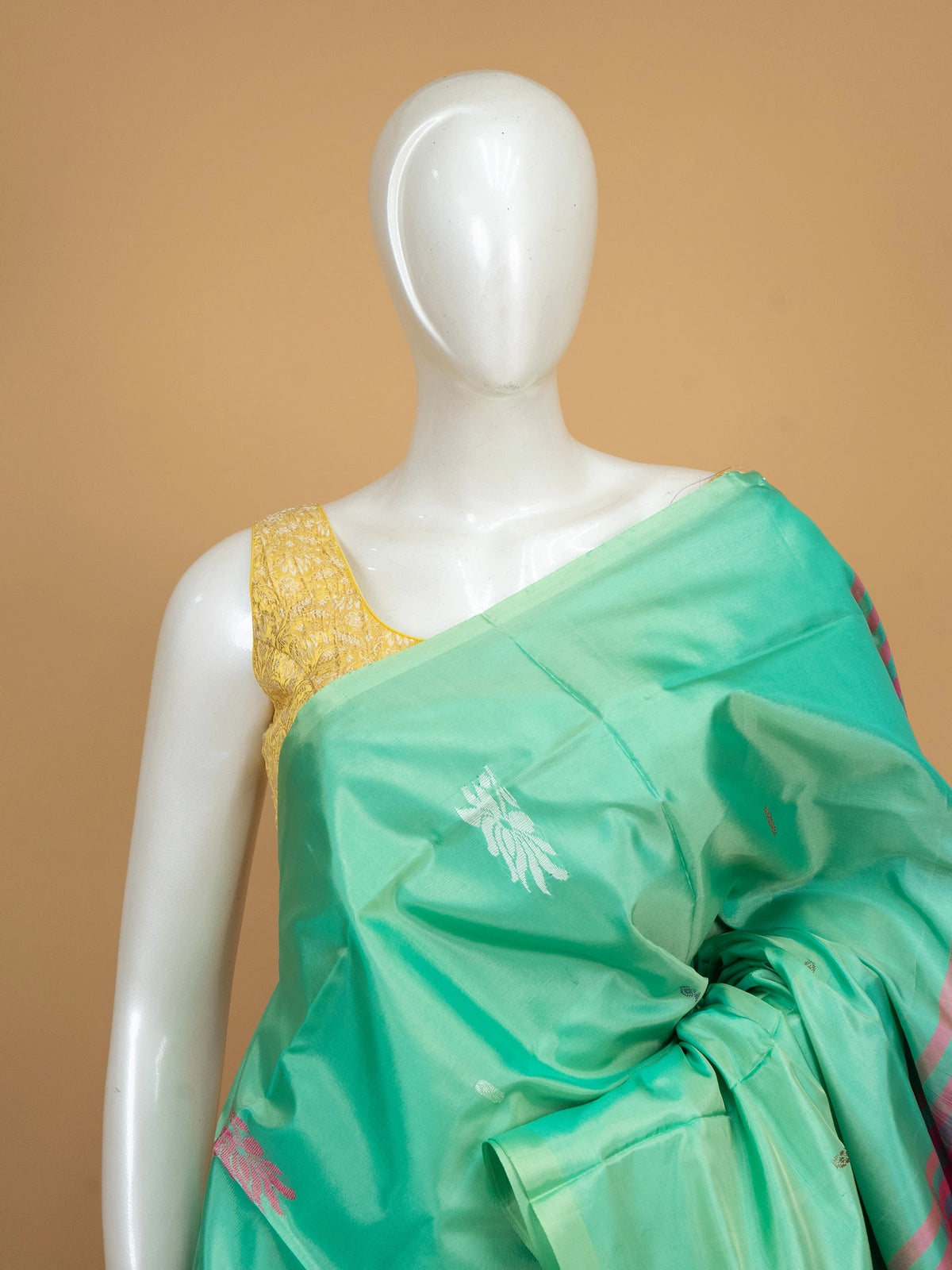 Sea green Banana Silk saree with contrast pink striped pallu and silver zari buttas