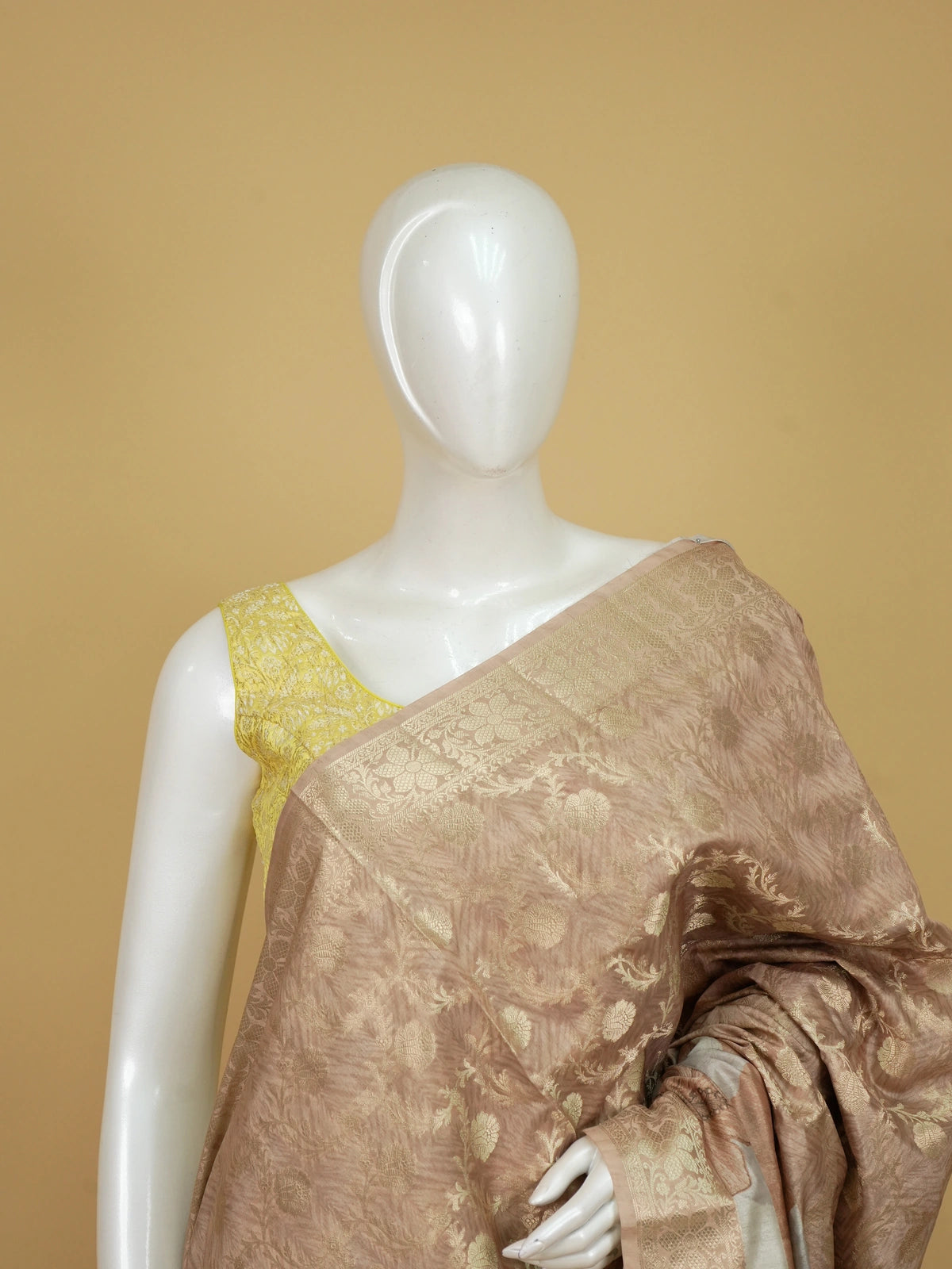 Beige and gold semi tussar saree with woven zari floral jaal and floral print pallu