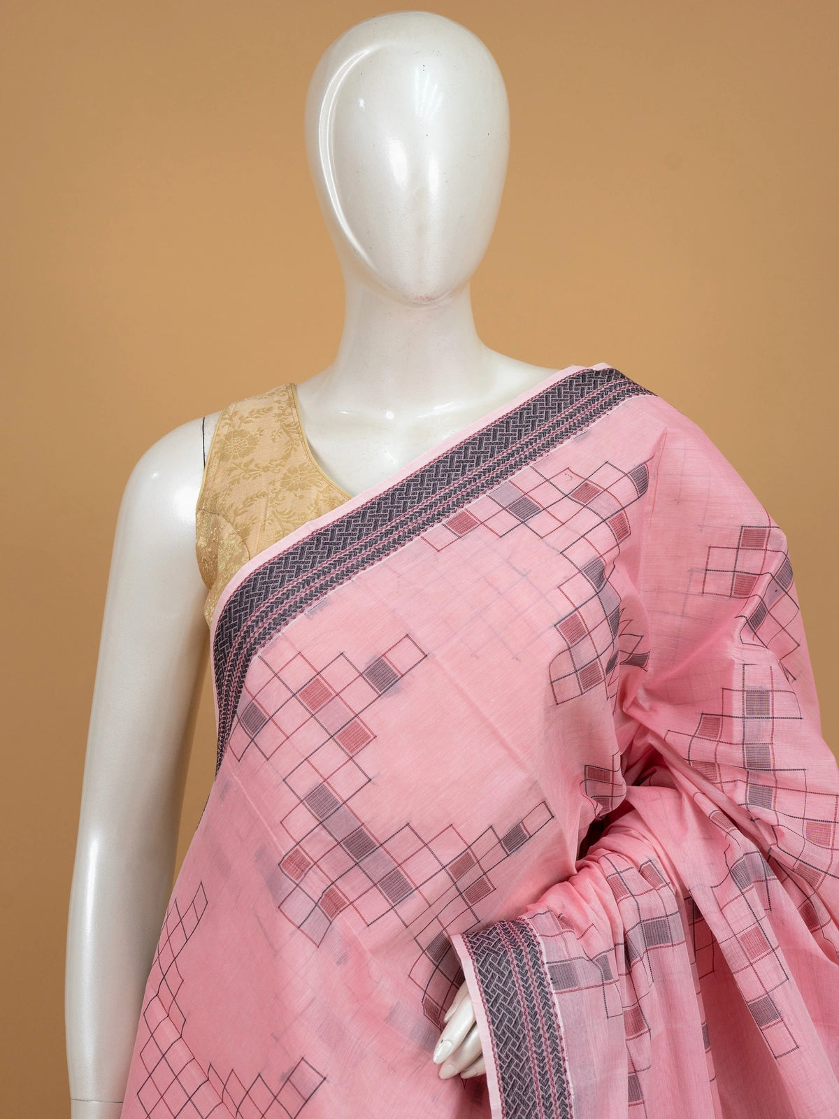 Pink silk cotton saree with grey geometric motifs and contrast border