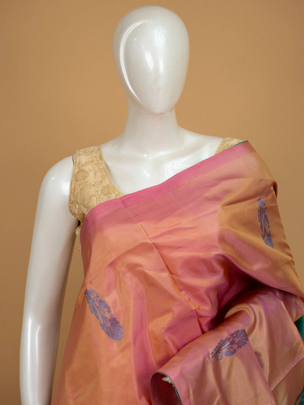 Peach pink and teal green banana silk saree with gold zari buttas and contrast striped pallu