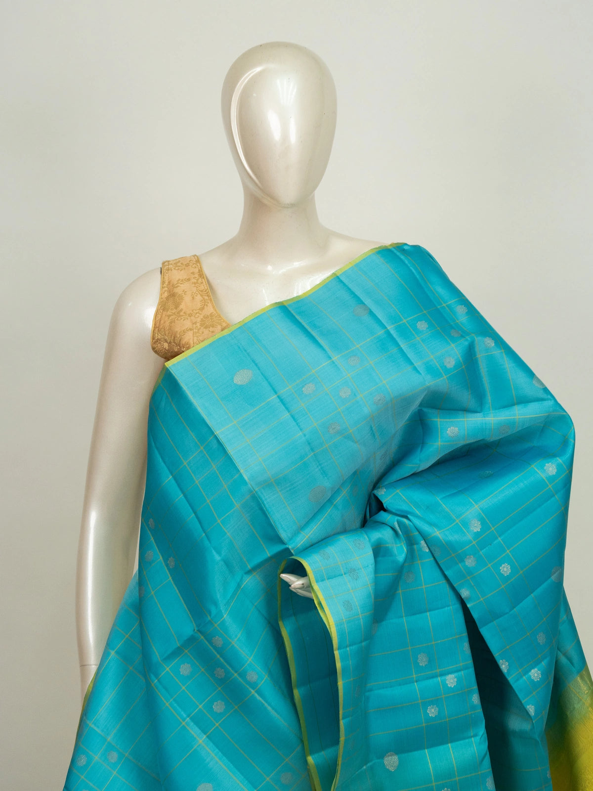 Turquoise blue Kanchipuram pure mix saree with gold zari checks and contrast lime-yellow border and pallu