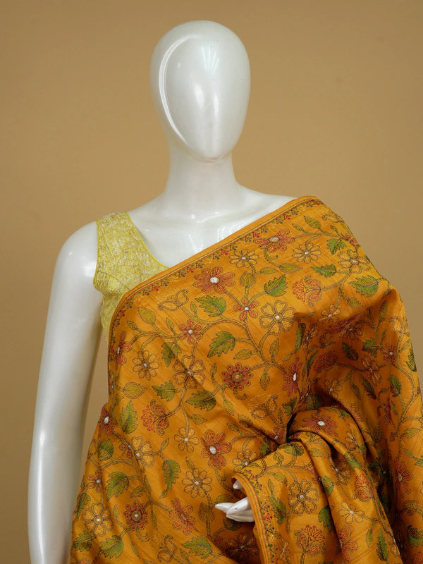 Mustard yellow semi tussar saree with allover multicolour floral embroidery and embroidered pallu