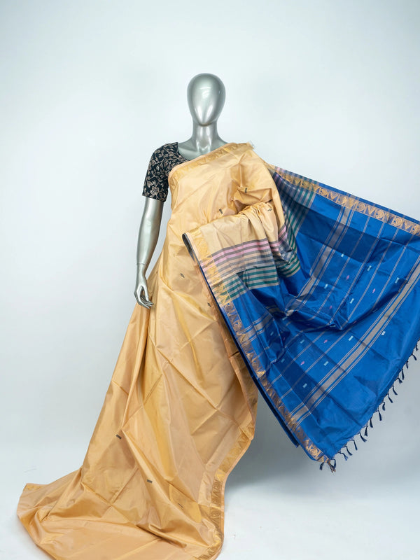 Cream Banana Silk saree with contrast blue pallu and gold zari border