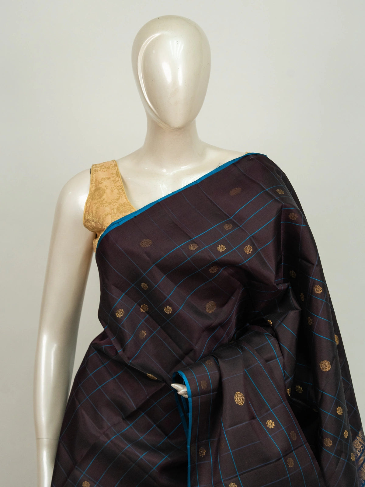 Dark brown Kanchipuram Pure Mix saree with blue checks, gold zari buttas and contrast peacock blue zari pallu and border