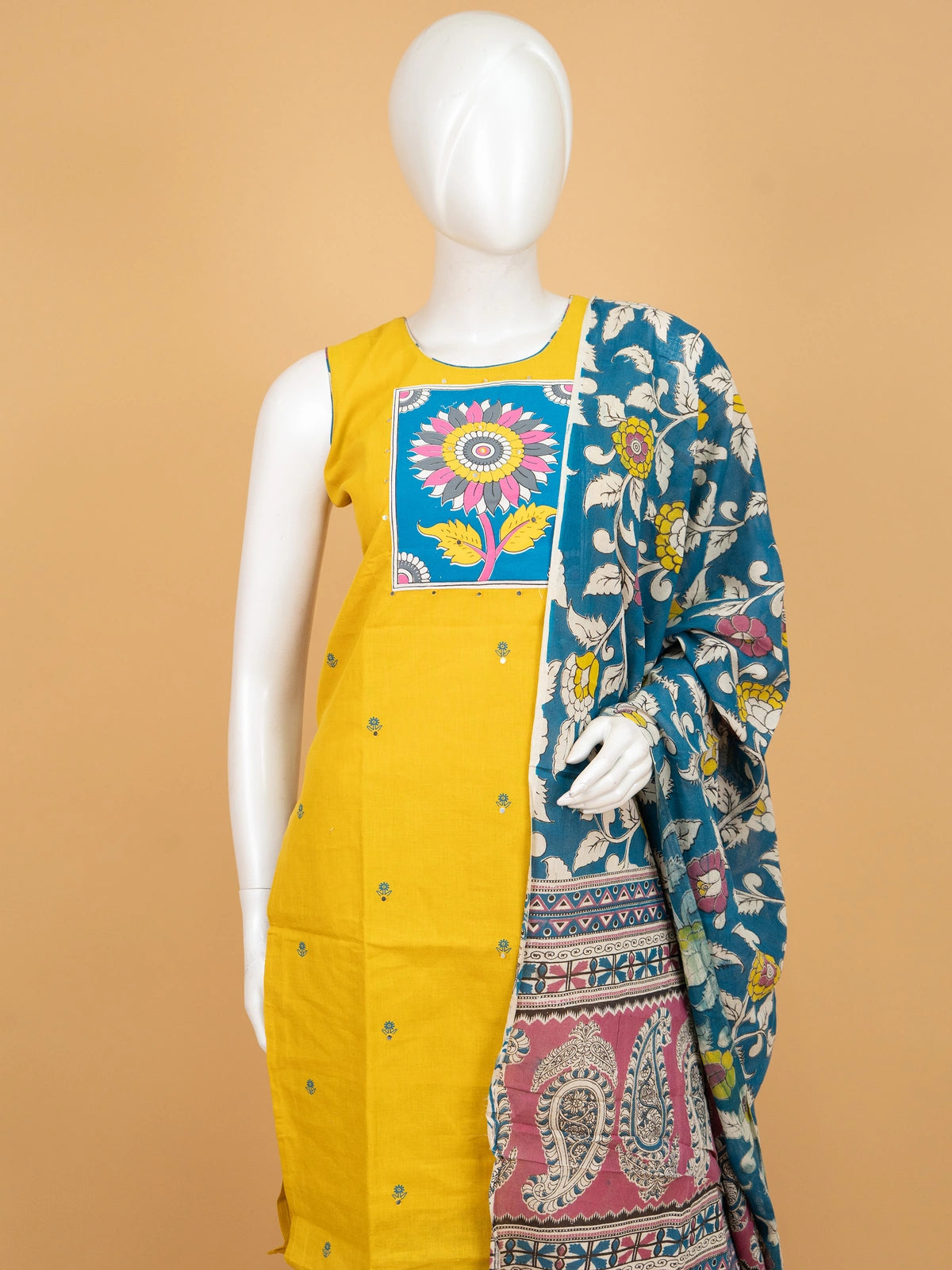 Mustard Yellow cotton straight cut kurti set with Kalamkari floral print yoke, teal printed pants and matching dupatta