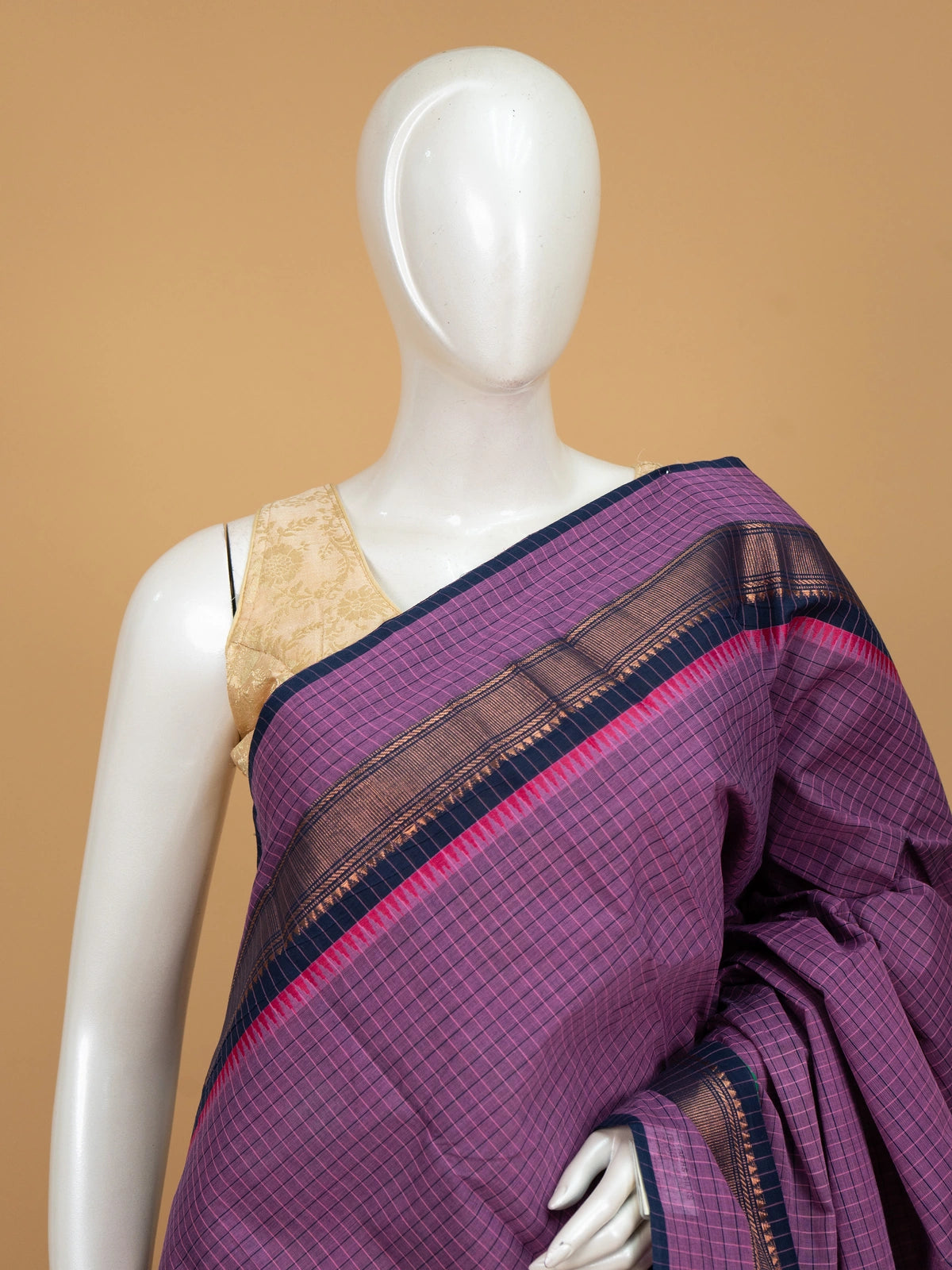 Purple Chettinad cotton saree with woven checks and contrast navy blue temple border