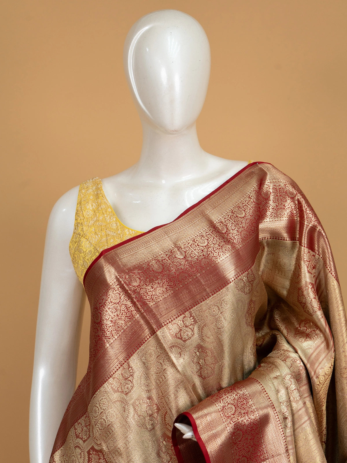 Golden beige pure Kanchipuram silk saree with gold zari motifs and contrast maroon border and pallu