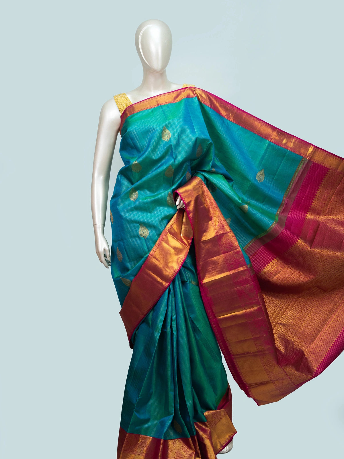 Peacock teal pure Kanchipuram silk saree with gold zari checks, woven buti motifs and contrast pink zari border