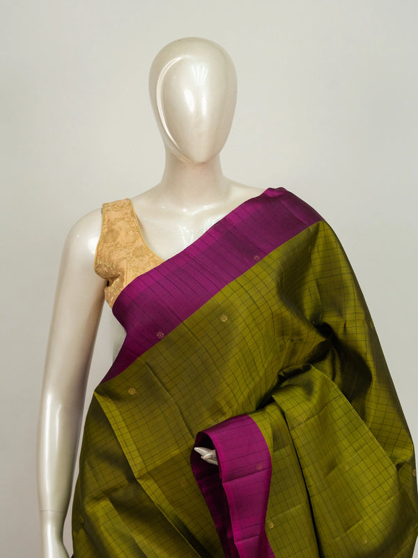 Mehendi green Kanchipuram Pure Mix saree with magenta contrast border and gold zari pallu