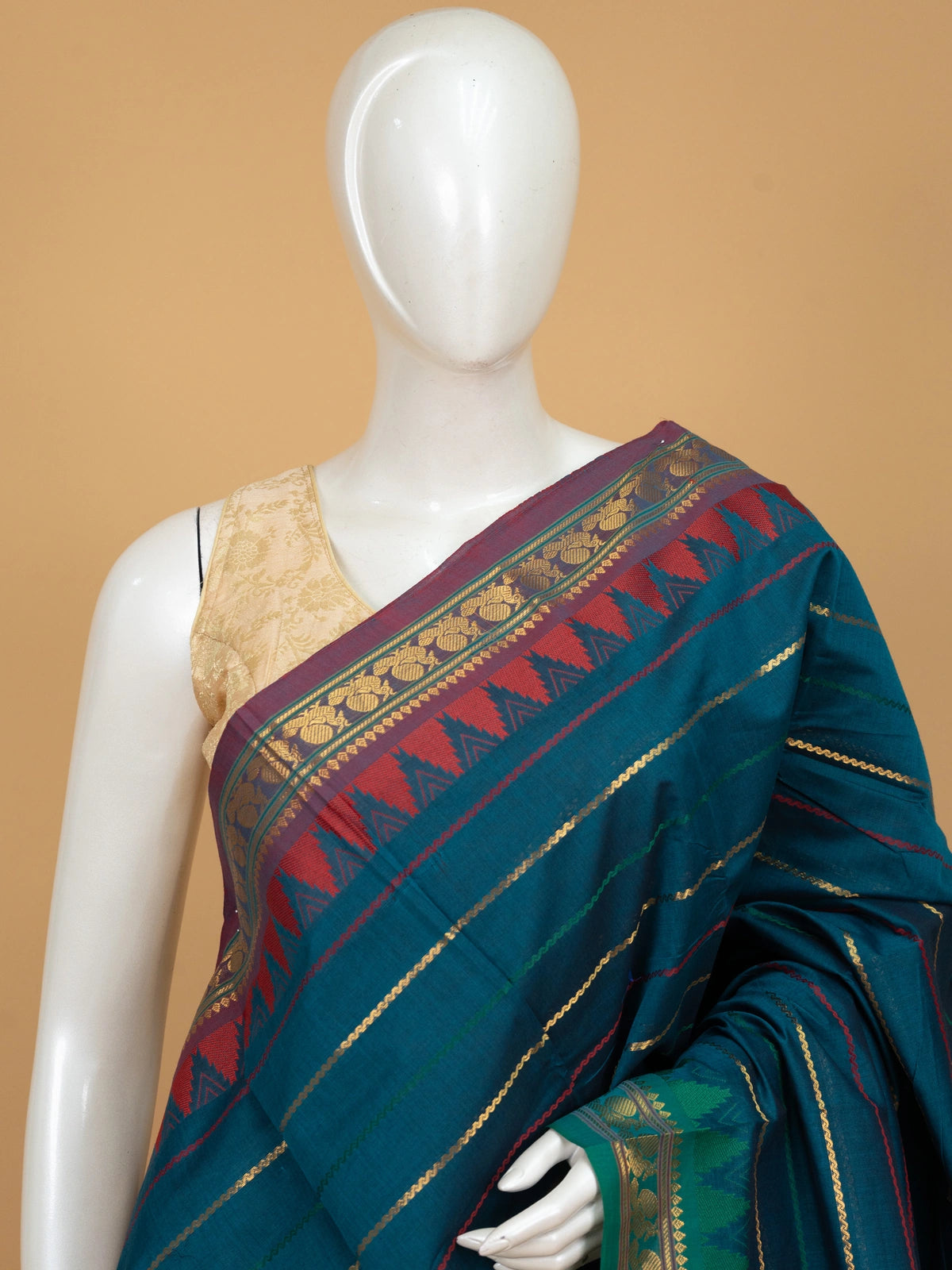 Peacock blue Chettinad cotton saree with contrast maroon temple border and green zari-striped pallu
