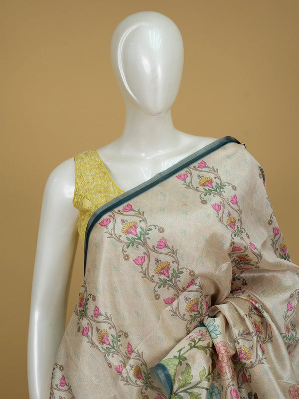 Cream semi tussar saree with floral print, teal border and pichwai landscape pallu