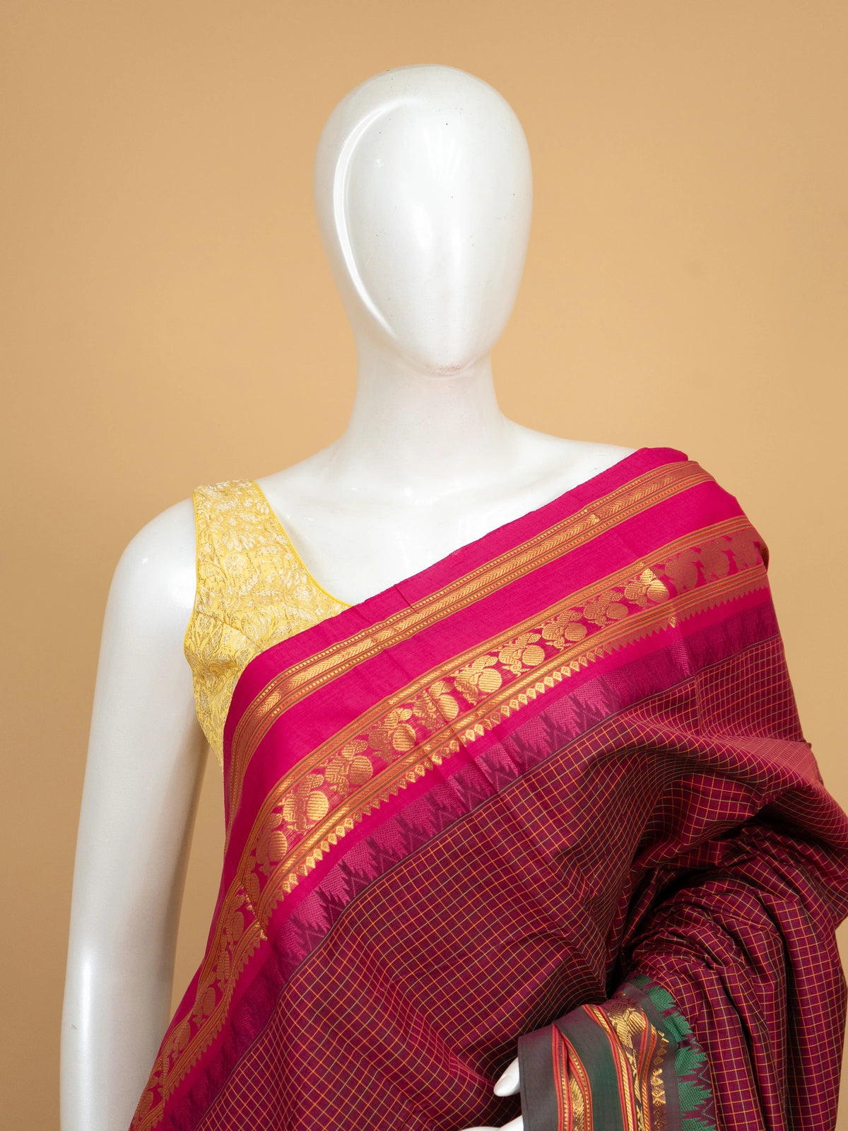 Magenta checked Chettinad cotton saree with pink gold-zari border and green striped pallu
