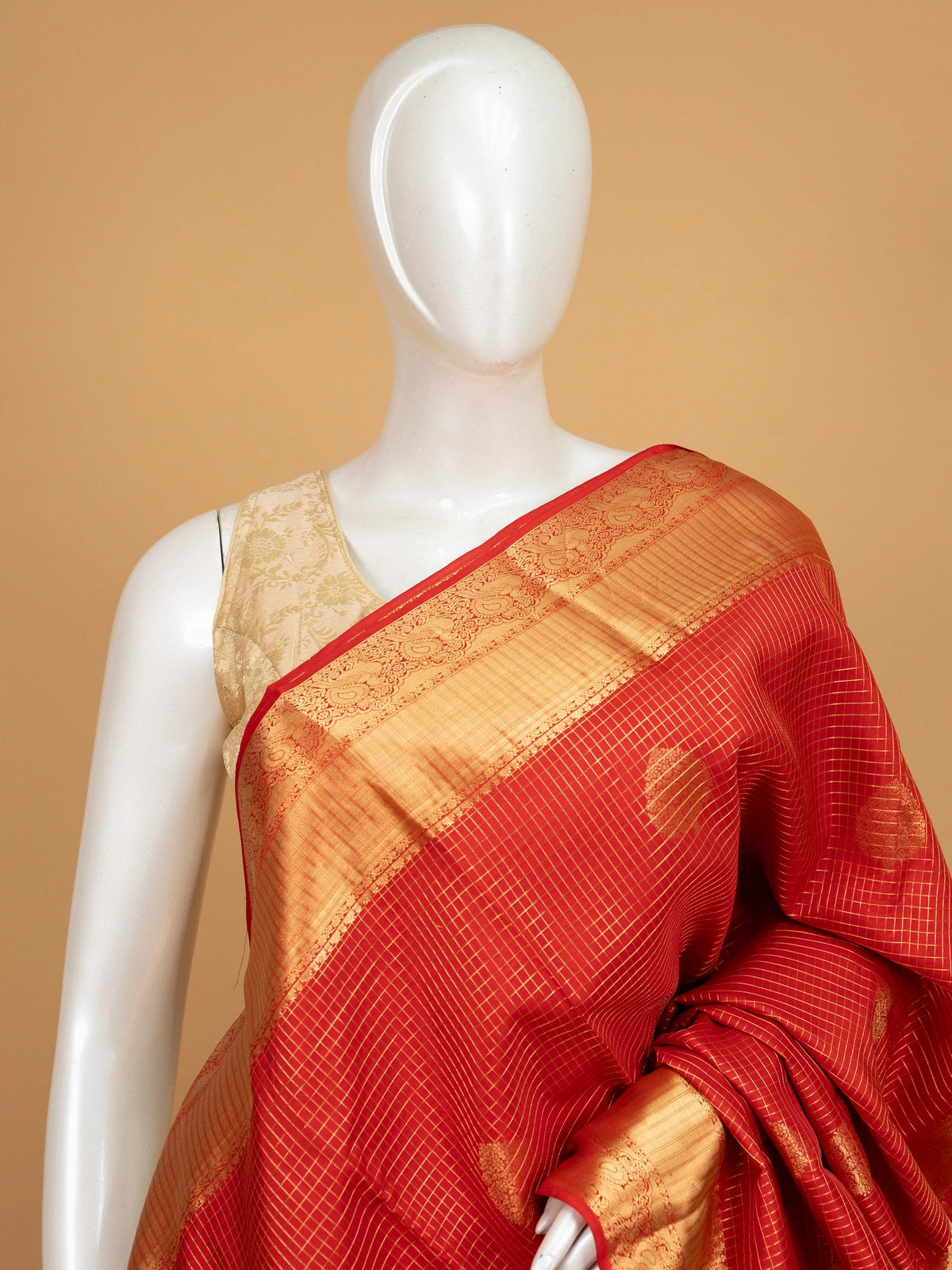 Red pure Kanchipuram silk saree with gold zari checks and contrast gold zari border