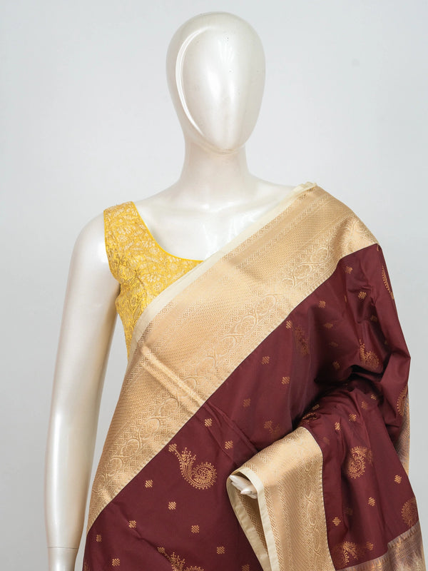 Maroon and cream semi silk saree with gold zari paisley motifs and contrast cream floral zari border