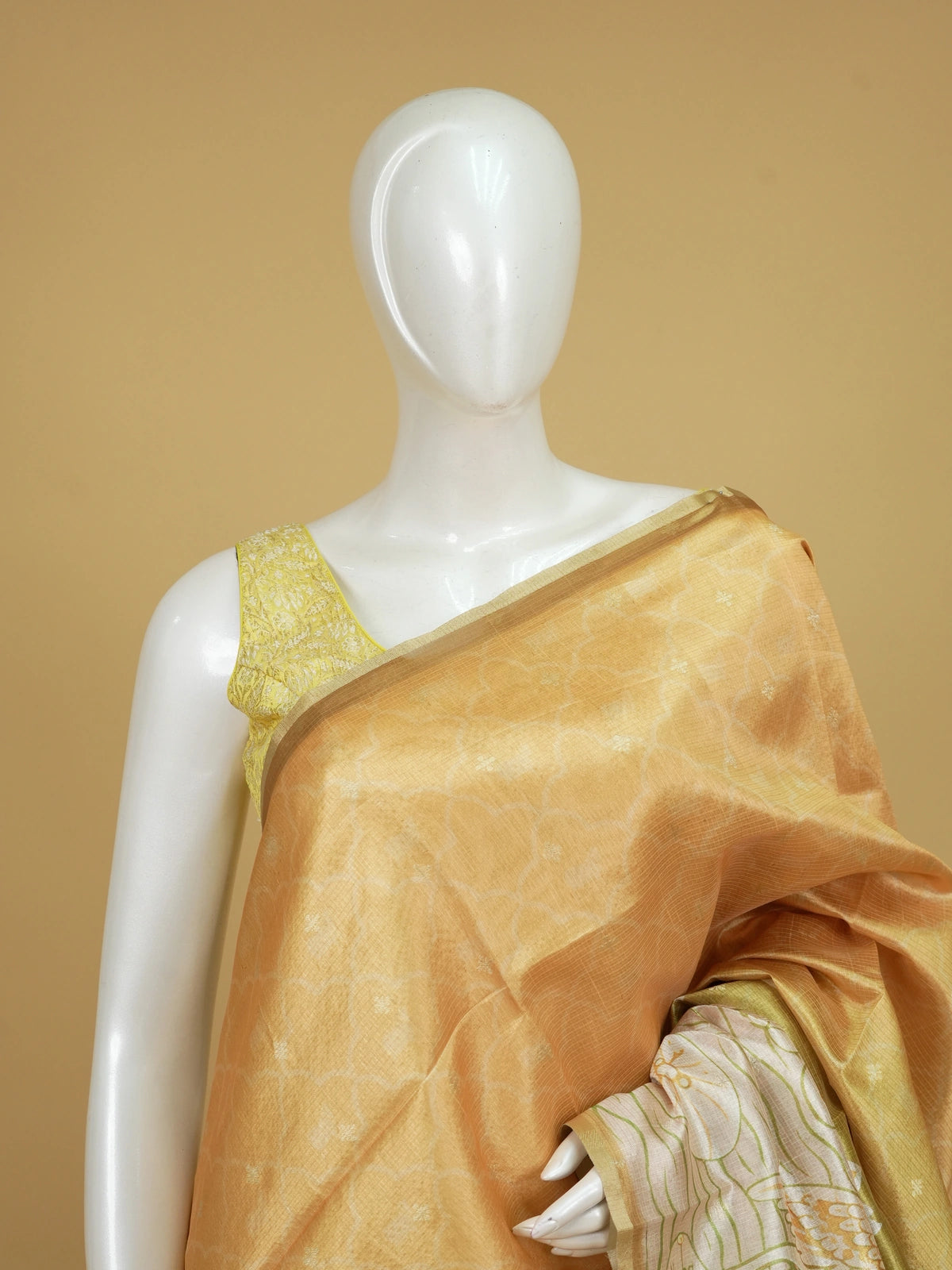 Mustard yellow and olive green Semi Tussar saree with white lotus-pond print and gold zari border