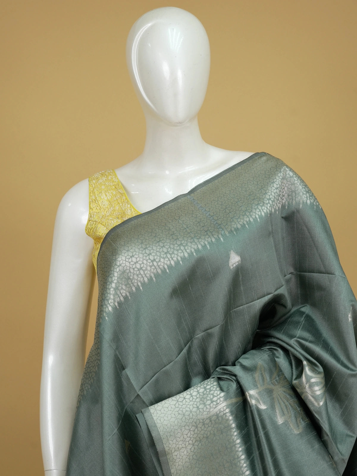 Sage grey semi tussar saree with silver zari floral pallu and border