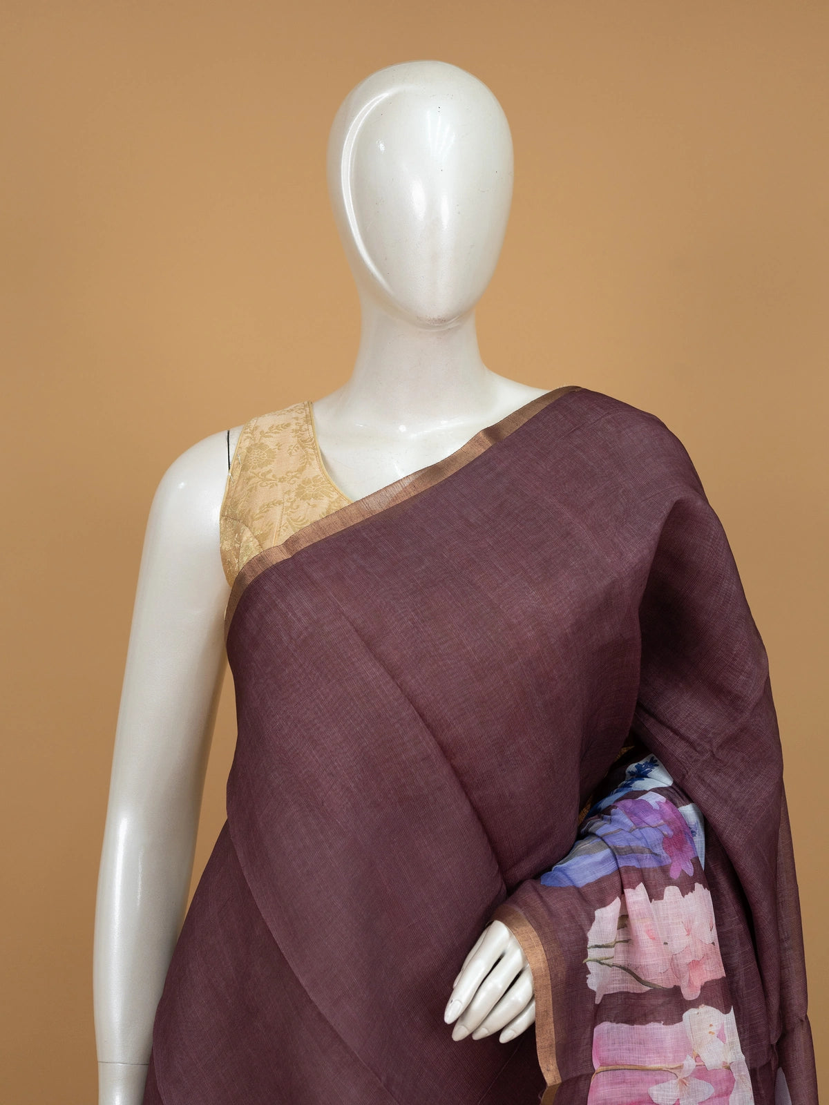 Mauve brown linen cotton saree with watercolour floral pallu and gold zari border