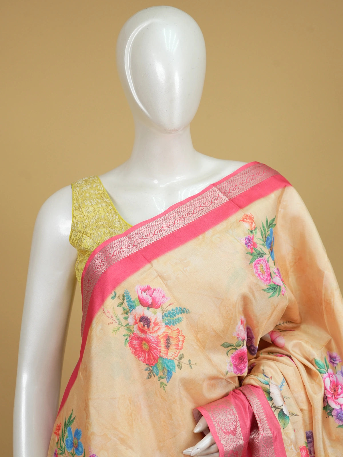 Cream Dola silk saree with multicolour floral print and contrast pink silver zari border
