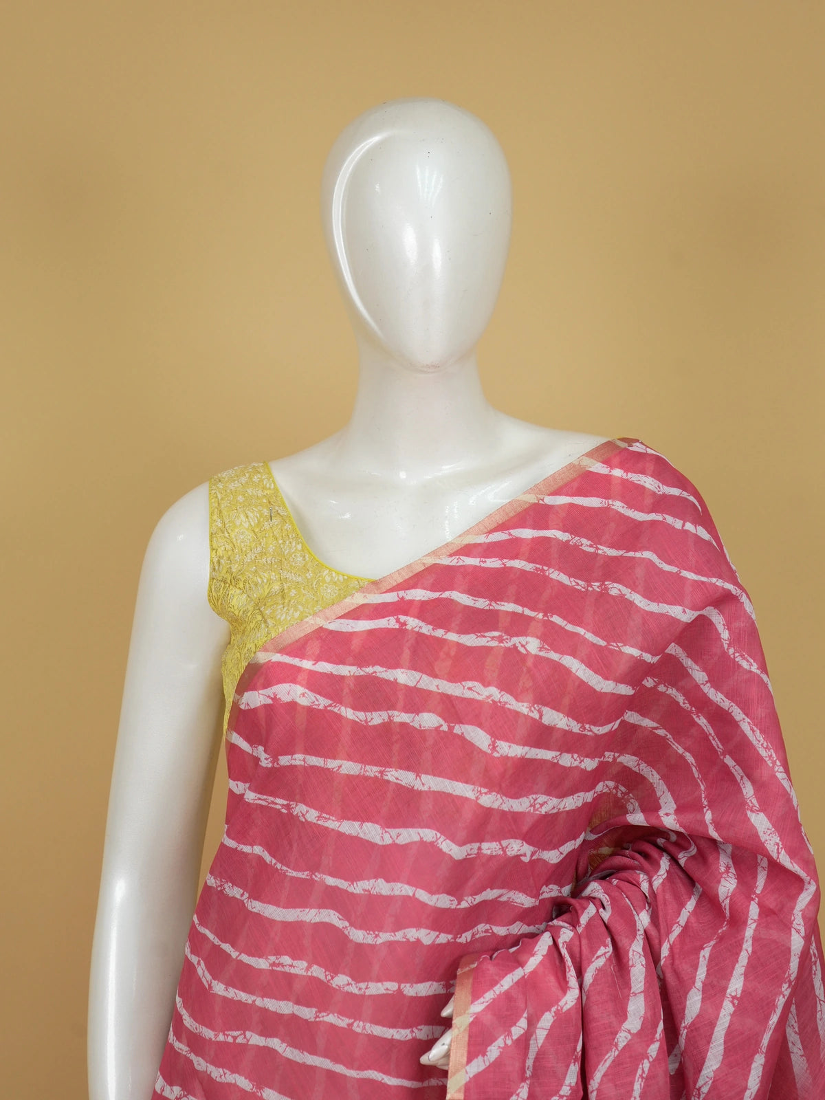 Pink and white leheriya linen cotton saree with batik floral pallu and gold zari border