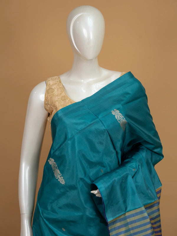 Teal blue banana silk saree with contrast purple pallu and gold zari border