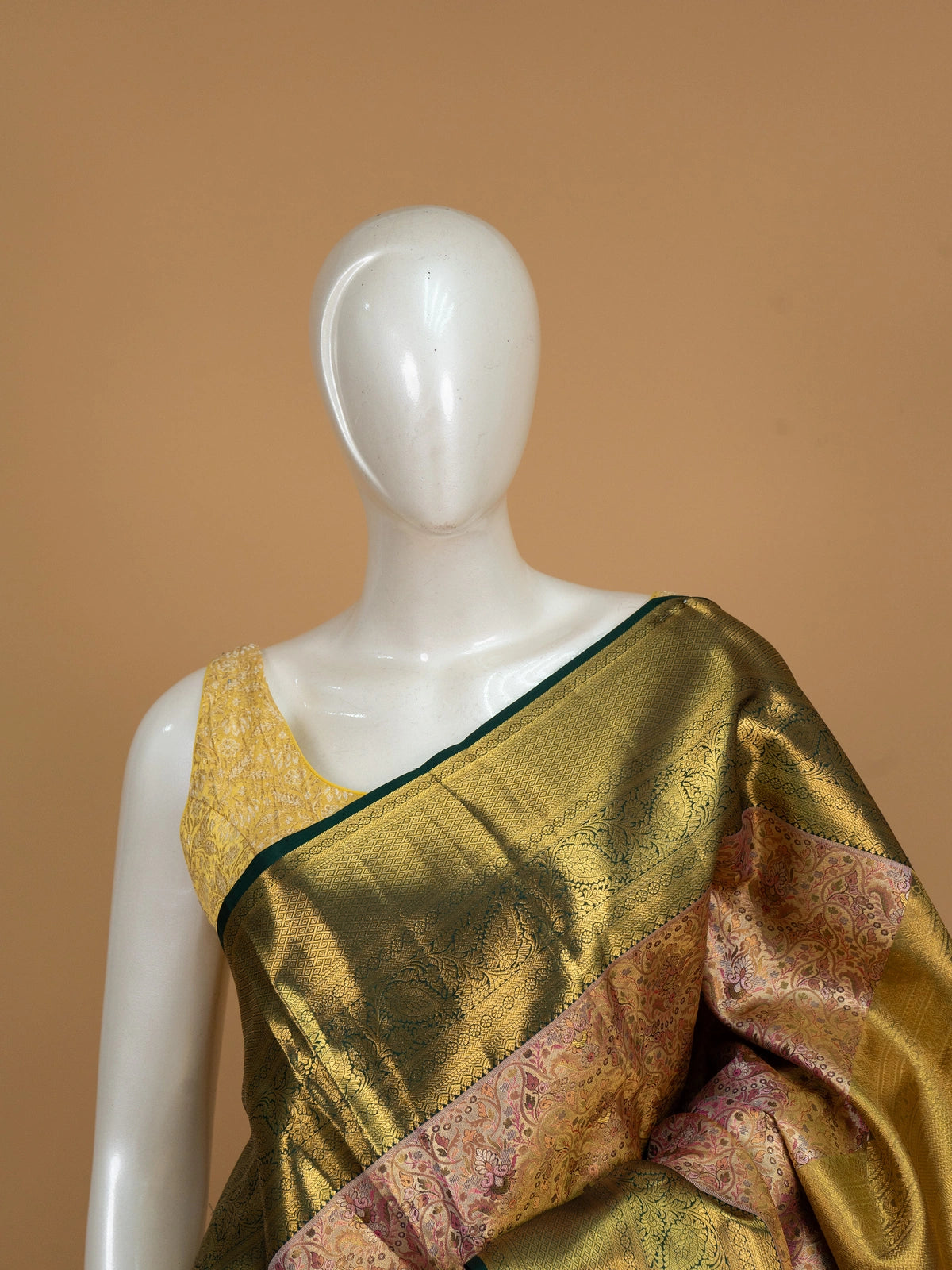 Mauve pink Pure Kanchipuram silk saree with multicoloured floral brocade body and contrast green gold zari border