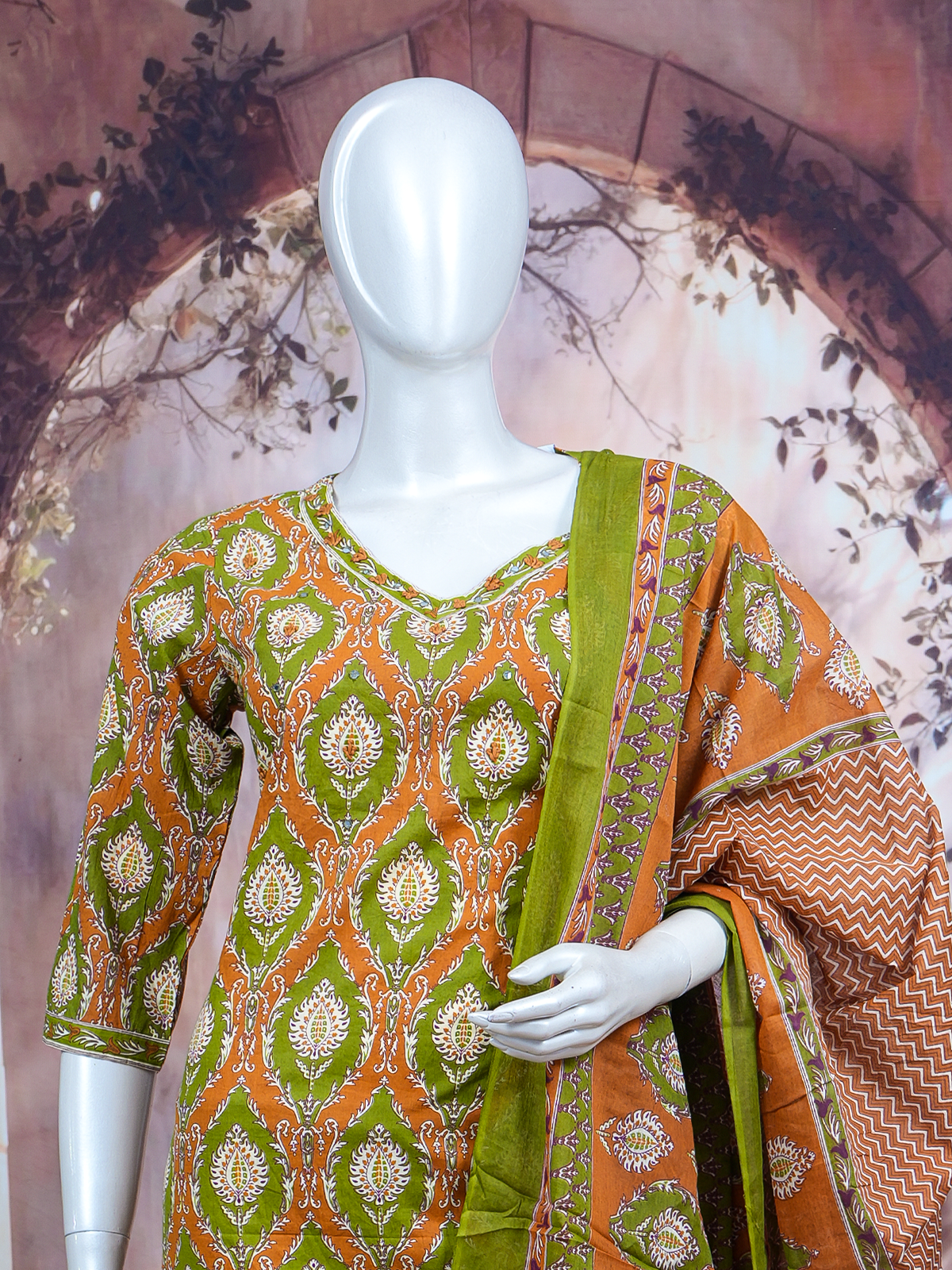 Orange and green printed cotton kurti set with straight pants and contrast green border dupatta