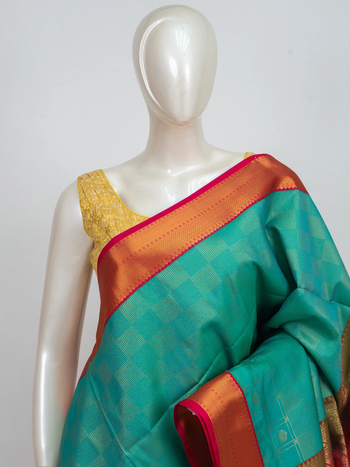 Teal green Kanchipuram Fancy Silk saree with gold zari checks and contrast red zari border and pallu