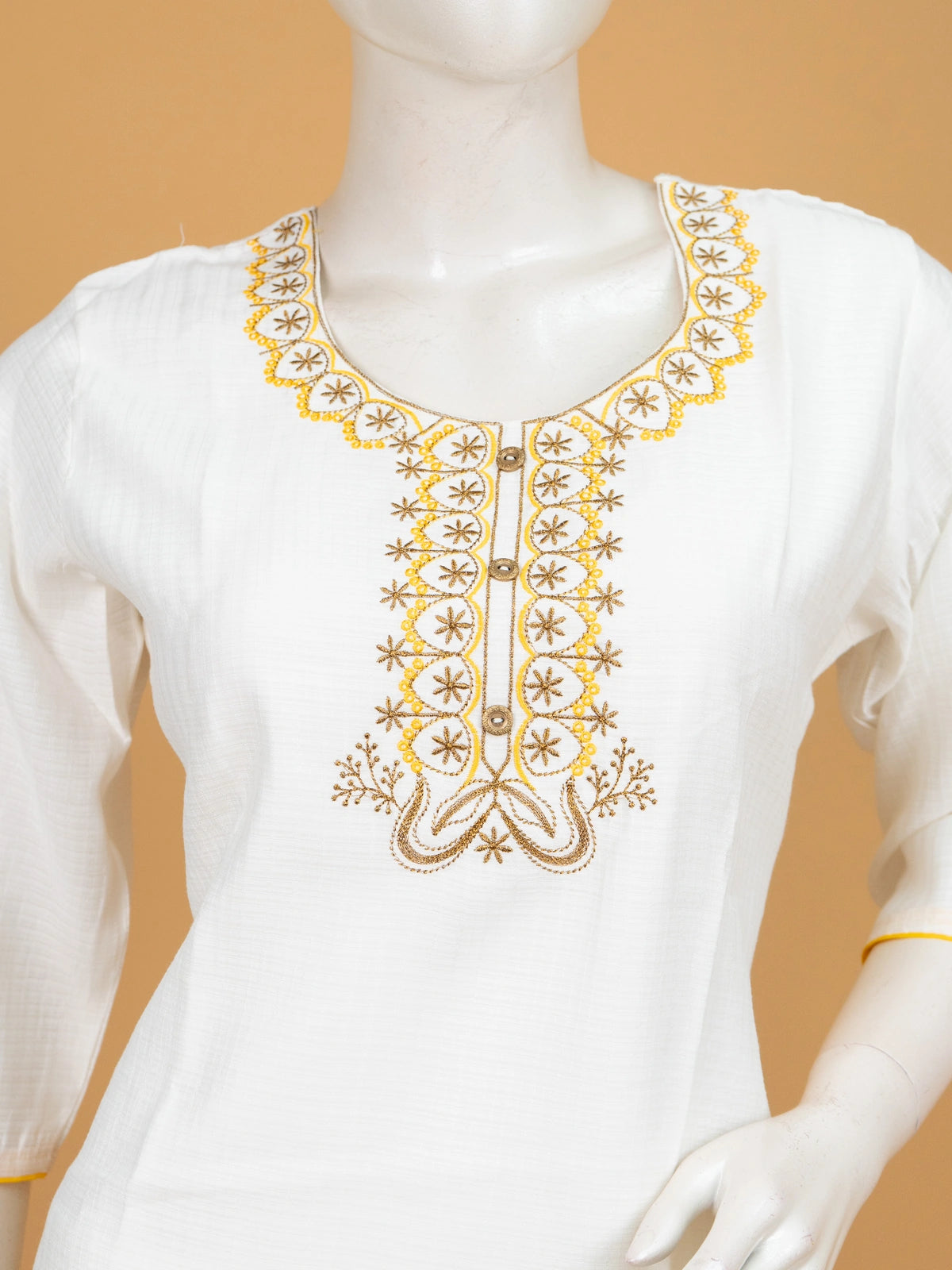 White cotton Anarkali kurti with yellow floral embroidery on neckline and hem