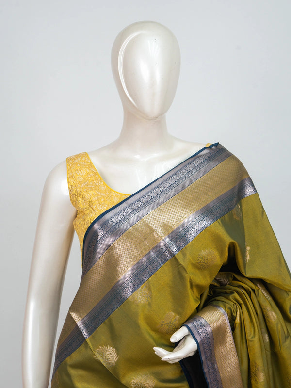 Olive green semi silk saree with teal blue contrast zari border and zari butta motifs