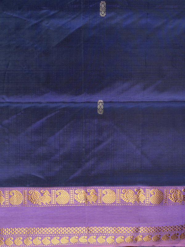 Navy blue banana silk saree with mauve-pink contrast pallu and gold zari peacock border